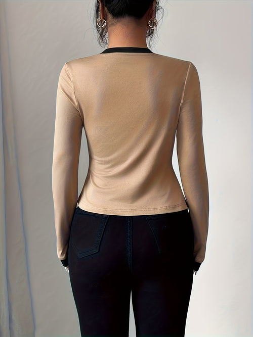 Elegant long-sleeve women’s top with color-block waist design